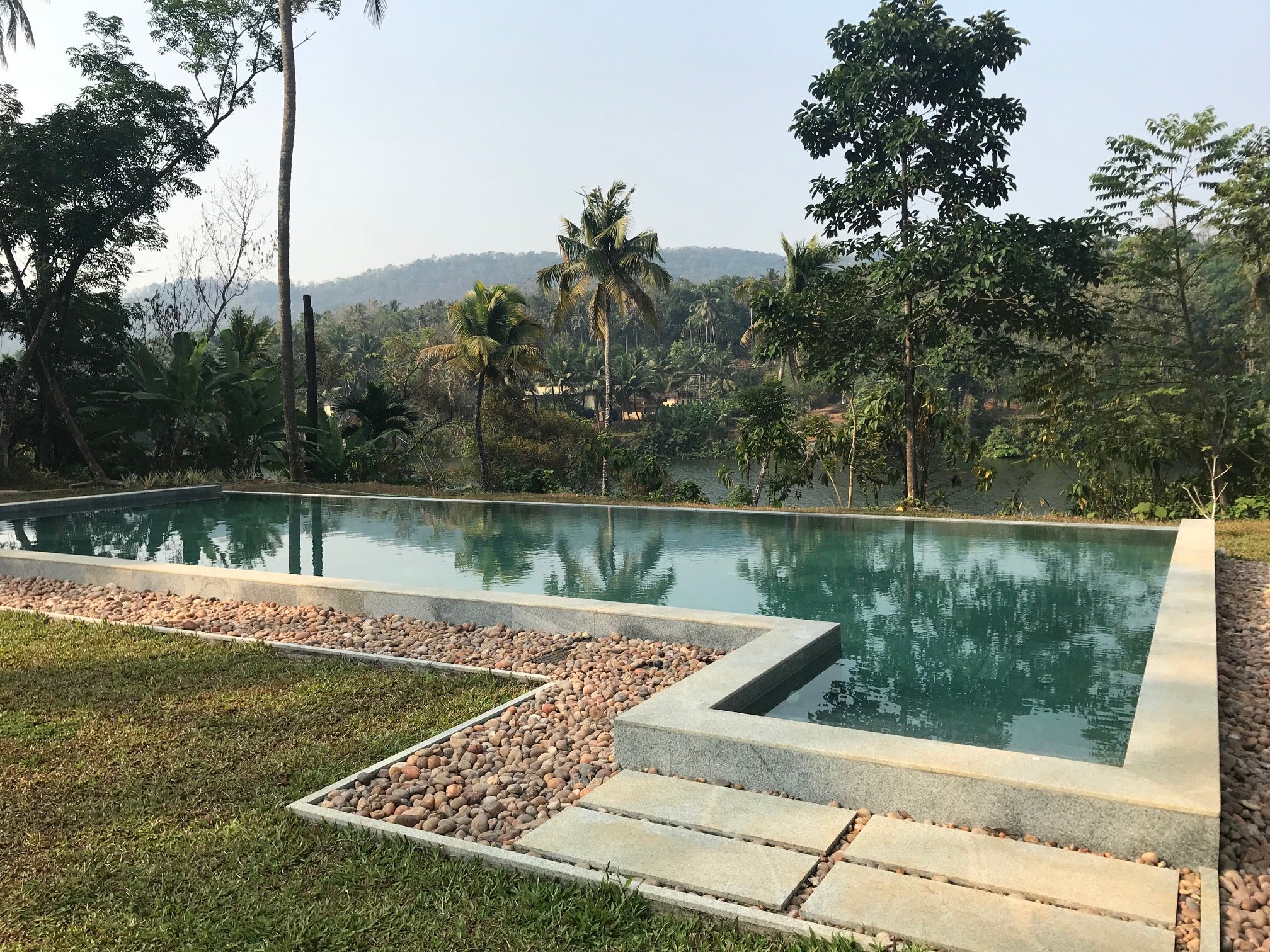 The pool at Windermere River House with views of the Periyar River The pool at Windermere River House with views of the Periyar River